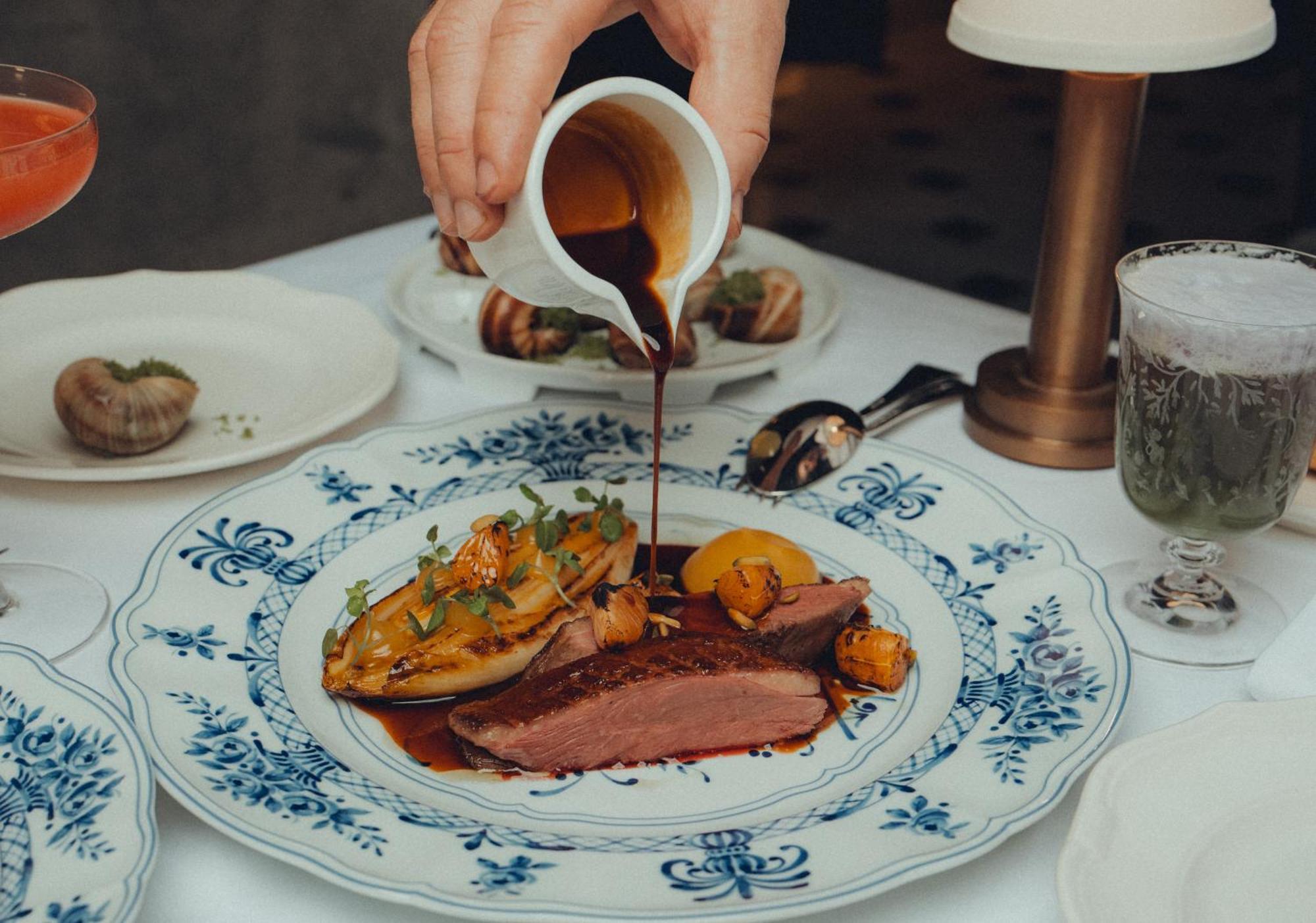 Five Luxe Hotel Dubai Eksteriør billede A duck dish at the restaurant
